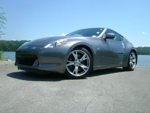Like new one owner 2011 nissan 370z touring coupe leather bose sport pkge 5k mi.