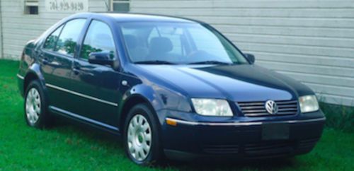 04 vw jetta *runs perfect*  no reserve!! /gas saver/4 door/black/2.0/manuel/