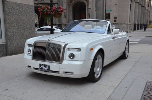 2009 rolls royce phantom drophead coupe.  english white with creme light.