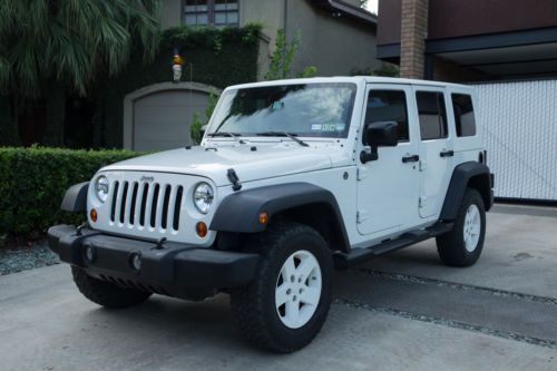 2009 jeep wrangler unlimited rubicon 4wd 3.8l  ***one owner***  34k miles!!!