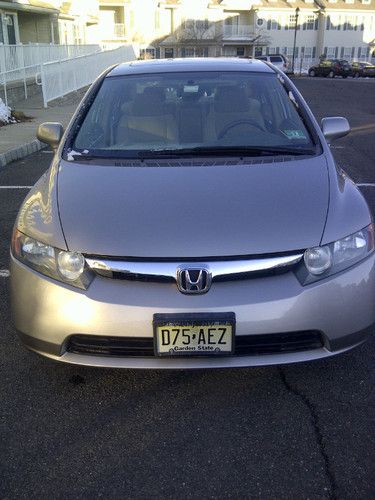 2006 honda civic ex sedan, champagne metallic, great condition, low miles