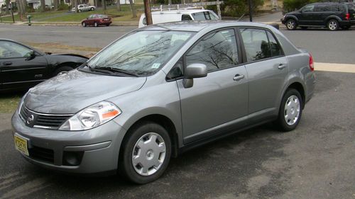 For sale 2009 nissan versa w/warranty