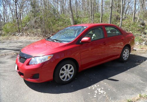 2009 red toyota corolla le