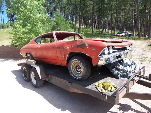 1969 ss 369,4 speed posi,silver red