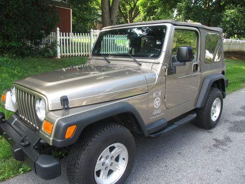 2004 wrangler x gold/tan 4.0l 5 spd manual a/c low miles exc cond