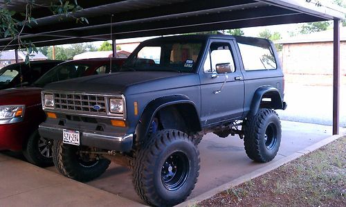 86 bronco ii, 5.0 auto, 9" lift on 36's     no reserve