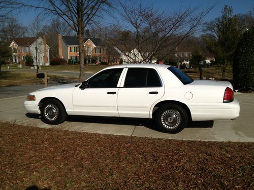 White with gray cloth interior, excellent condition, 4 doors, runs excellent.