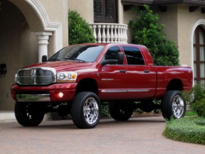 Mega cab ( laramie ) lifted! sunroof...low miles 58k