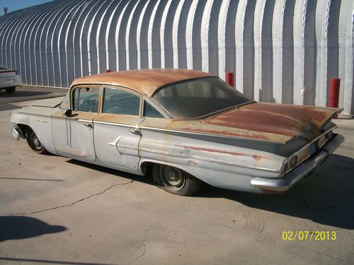 1960 chevrolet bel air base sedan 4-door 3.9l
