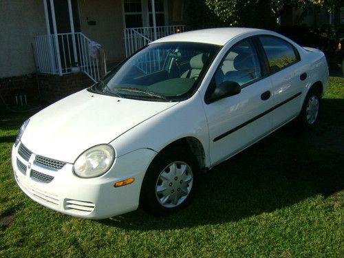 2004 dodge neon 95k miles,auto,a/c dependable smogged,salvg title,