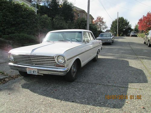 1963 nova ss white w/ blue interior, automatic w/ shifter on the floor