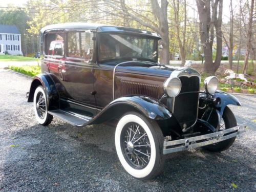 Restored, new black and root beer paint looks awesome with the tinted glass