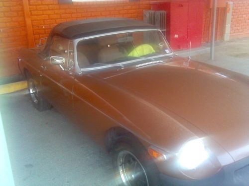 1980 mgb, convertible, brown, good driveable condition.