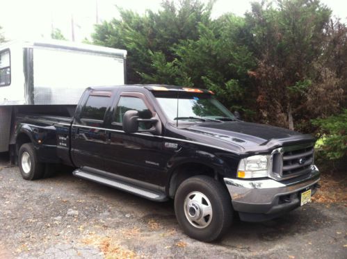 2002 ford f-350 super duty lariat 4-door 7.3l and 2002 continental cargo trailer