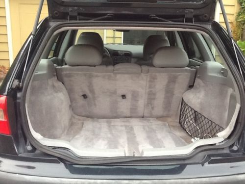 Dark Blue Volvo Wagon with Gray Upholstery, image 5
