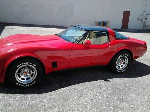 Corvette, 1980, red, tan int. t-tops(mirrored). auto, air(works)ps/pb/pw/pl/.
