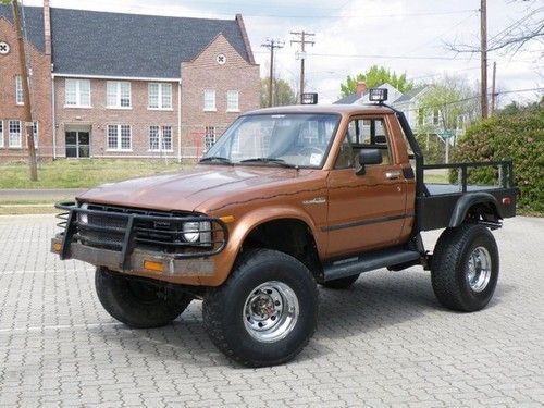 81 toyota pick up lifted custom flat bed  4x4