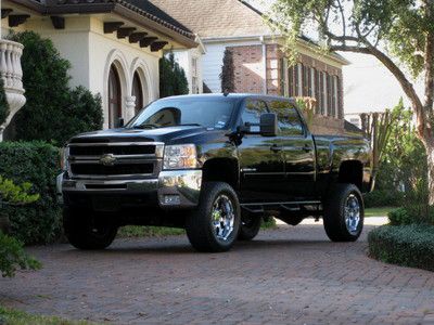 Crew cab short bed ( leather ) lifted! 1 owner...