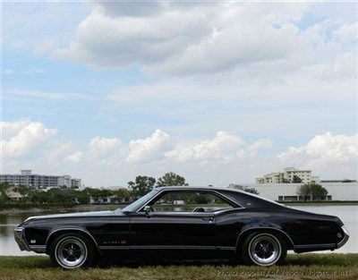 Wicked looking riviera * hide away lights * gran sport * a/c * power everything!