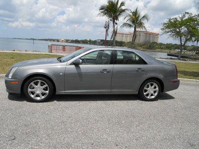 Sts fl one fl owned moonroof navi heated cooled seats back up sensors michelins