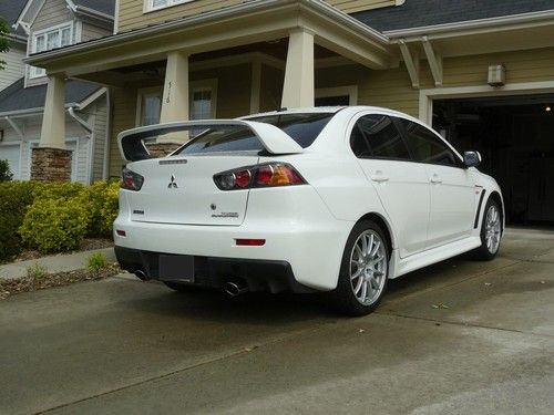 2011 evolution gsr, 8k miles, all stock, fully loaded, $39k when new, evo x