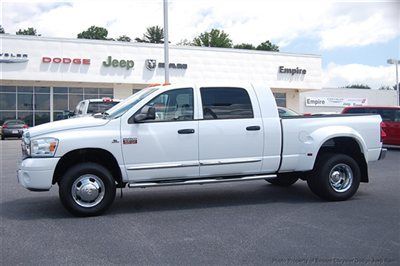 Save at empire dodge on this nice mega cab laramie cummins 4x4 w/ chrome steps