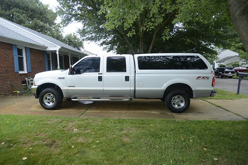 04 f250 fx4 lariat crew cab 8ft bed camper top awesome truck!