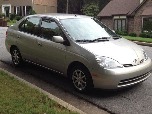 44k miles!  silver/tan exterior with grey leather interior- garaged vehicle.