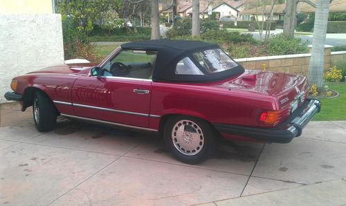 Fully restored, new burgundy exterior, tan leather interior, teak interior trim