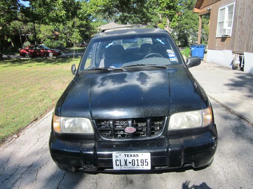 Brokedown*   2000 kia sportage w/ 4 waranteed tires mechanic special