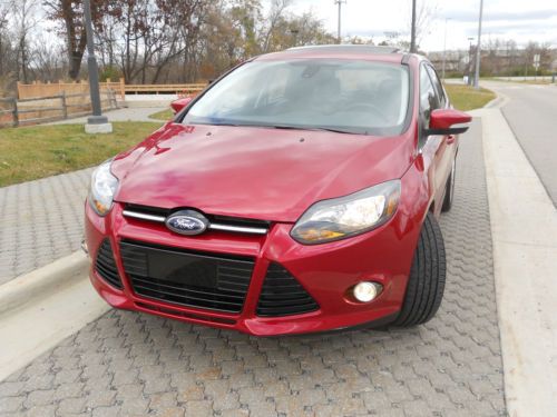 2012 ford focus titanium 2.ol/no reserve/sync/navi/ lthr/sunroof/salvage/rebuilt