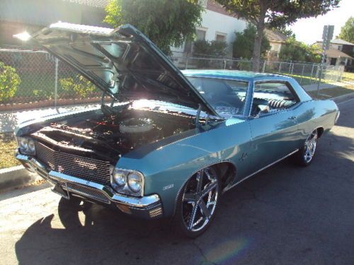 Really Clean aqua metallic 70 impala all new interior runs great!, image 3