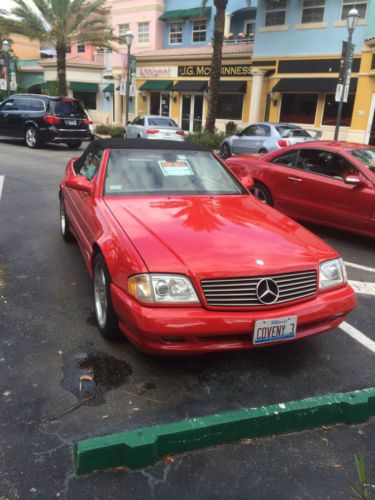 2000 mercedes sl500 convertable red 70,000 miles.  includes soft and hard tops