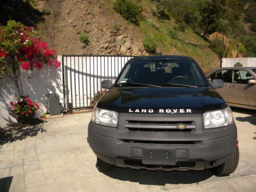 Beautiful black land rover- very low miles-  original owner -great auto