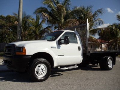 4x4 7.3 diesel 12ft aluminum flat bed!! fla truck!!