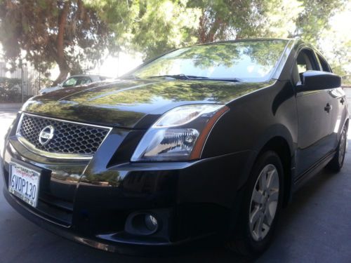 2012 nissan sentra s sedan 4-door 2.0l car still under warrenty!!