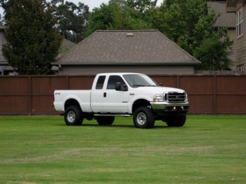 Supercab short bed ( lariat ) lifted! pristine..