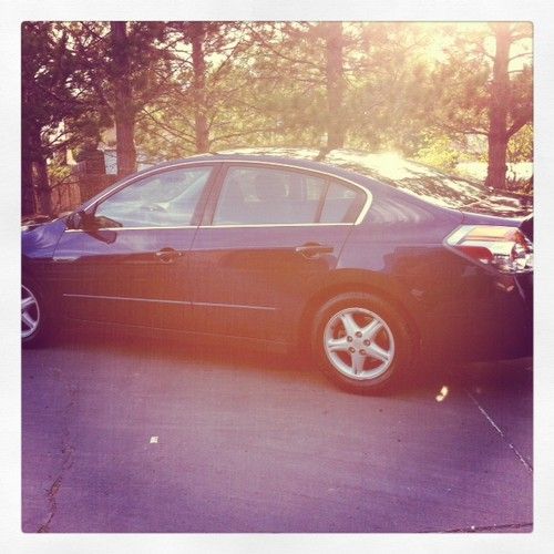 10,000 2008 blue nissan altima