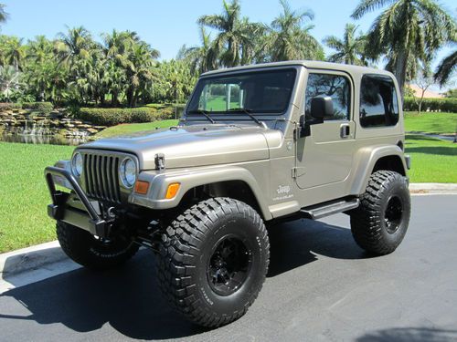 Automatic, hard top, 4 inches lifted, bf goodrich km2, mickey thompson wheels