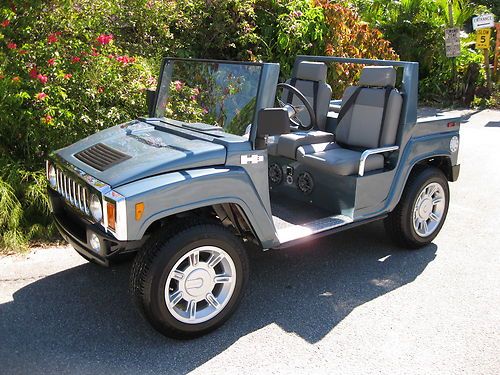 Hummer h3 electric golf cart by american custom golf cars