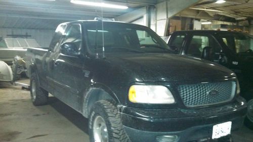 2001 ford f150 4x4 extended cab with plow