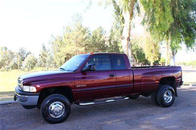 Low low miles, 1 owner 5.9 liter cummins diesel dual rear wheel 4x4 leather