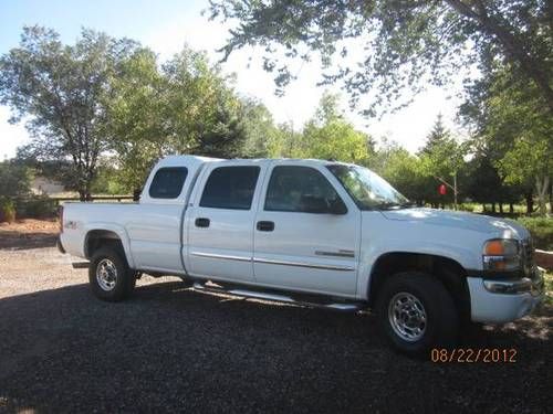 2003 gmc sierra 2500 diesel 4x4 conversion crew cab 7 passenger 3 row seating