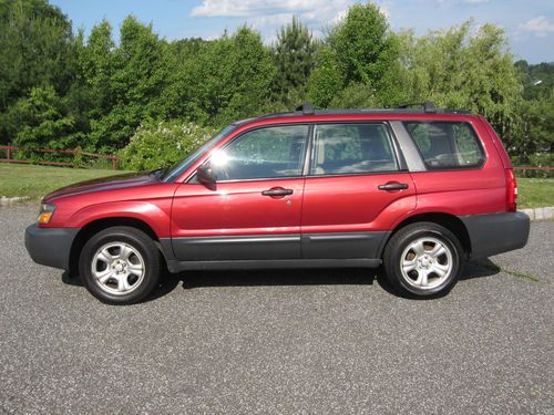 Red 2004 subaru forester x 2.5l