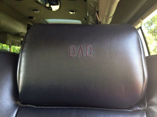 9 passenger,totally blacked out w/ ground effects, all black leather interior., image 7