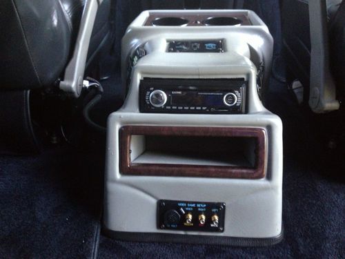 9 passenger,totally blacked out w/ ground effects, all black leather interior., image 12