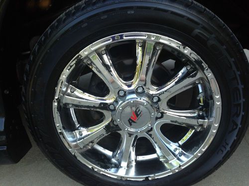 9 passenger,totally blacked out w/ ground effects, all black leather interior., image 14