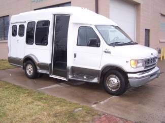 12 passenger bus - wc accessible 52k mis.  new paint