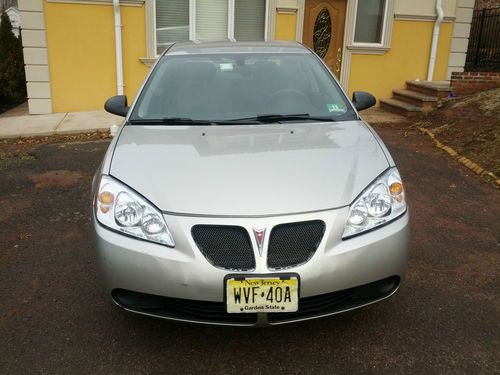 Good condition 2007 pontiac g6 sedan one owner vehicle  silver in color 89,899mi