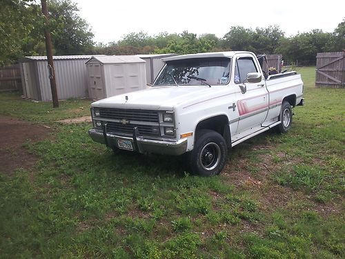 83 chevy silverado, white w/red trim and chrome accessories